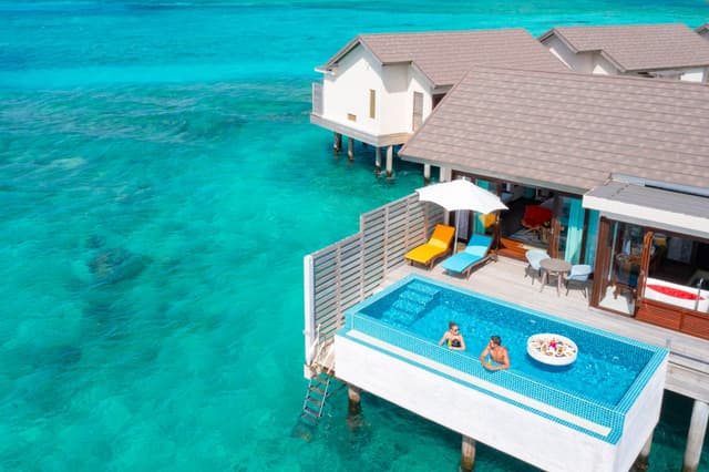Sunset water villa with pool
